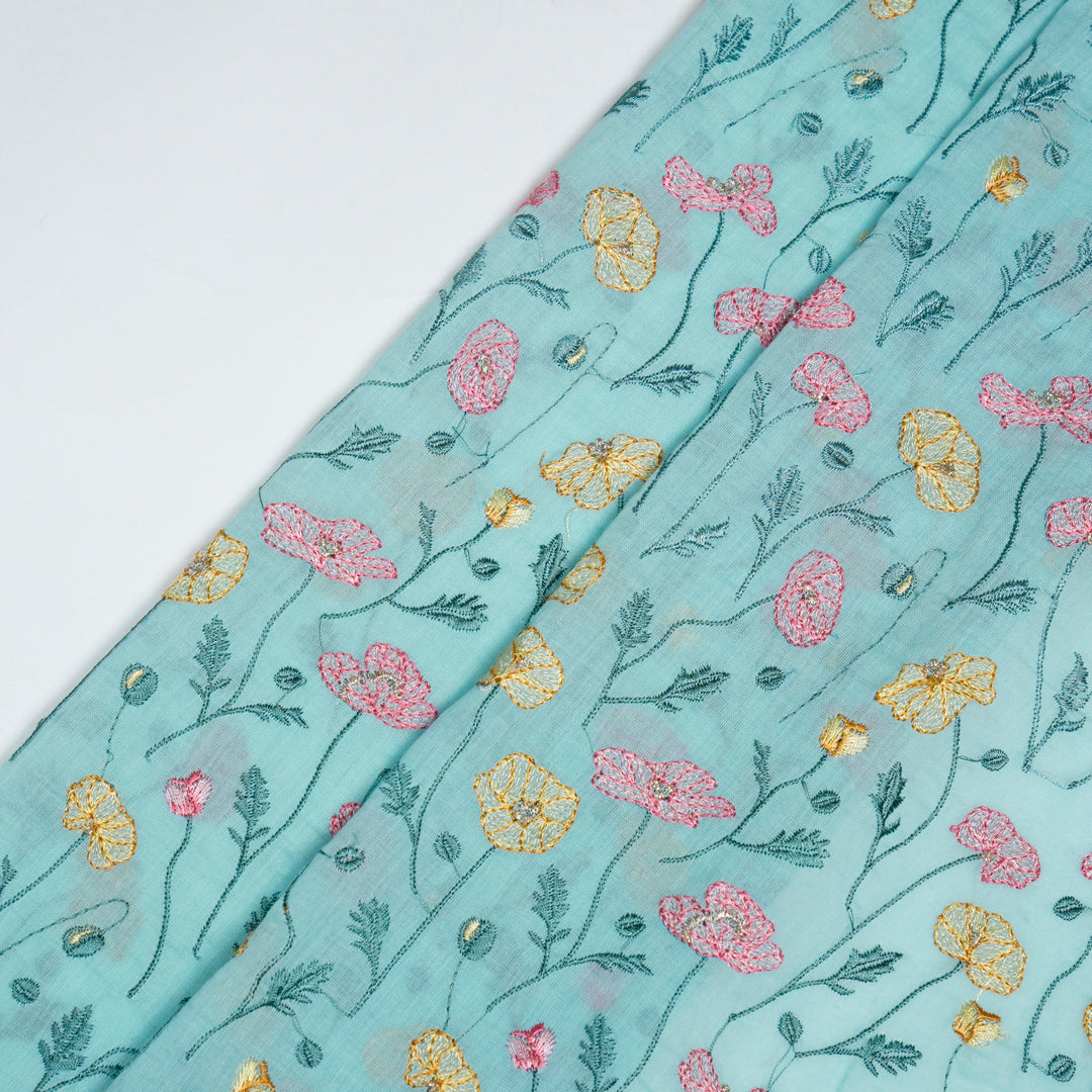 Tulika Jaal on Light Turquoise Malmal Embroidered Fabric