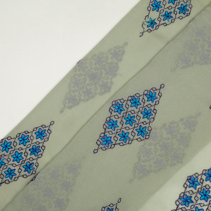 Aseela Buta on Light Grey Semi Georgette Embroidered Fabric