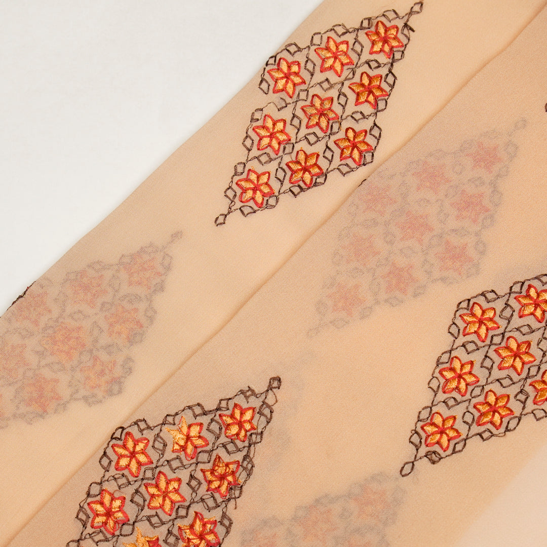 Aseela Buta on Light Peach Semi Georgette Embroidered Fabric