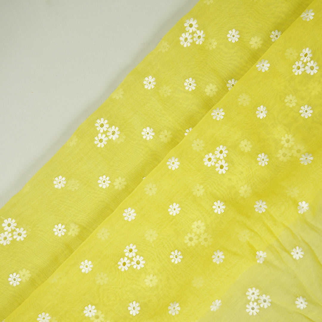 Riti Buti on Lime Green Cotton Silk Embroidered Fabric