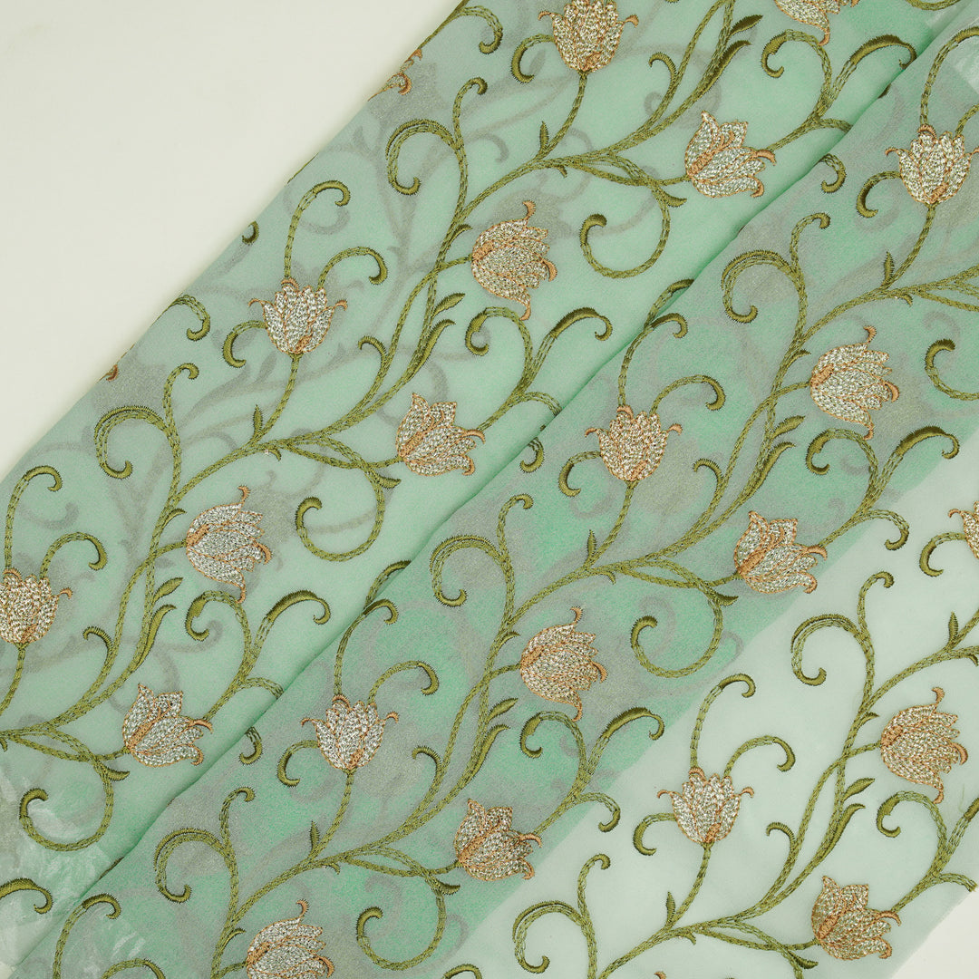 Tamira Jaal on Light Aqua Semi Georgette Embroidered Fabric