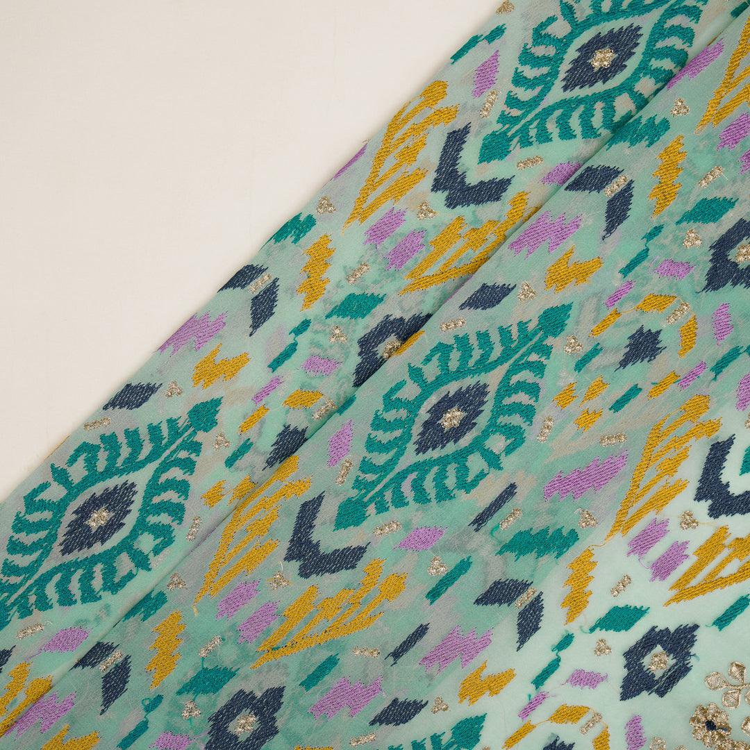 Rangvan Jaal on Lite Aqua Semi Georgette Embroidered Fabric