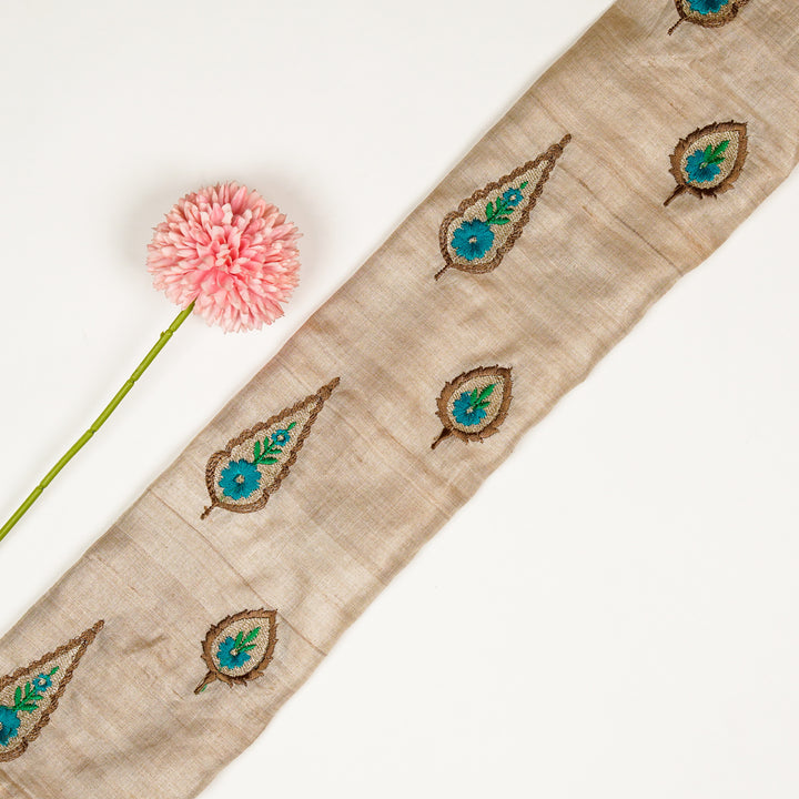 Nila Buta  on Natural/Turquoise Tussar Silk Embroidered Fabric