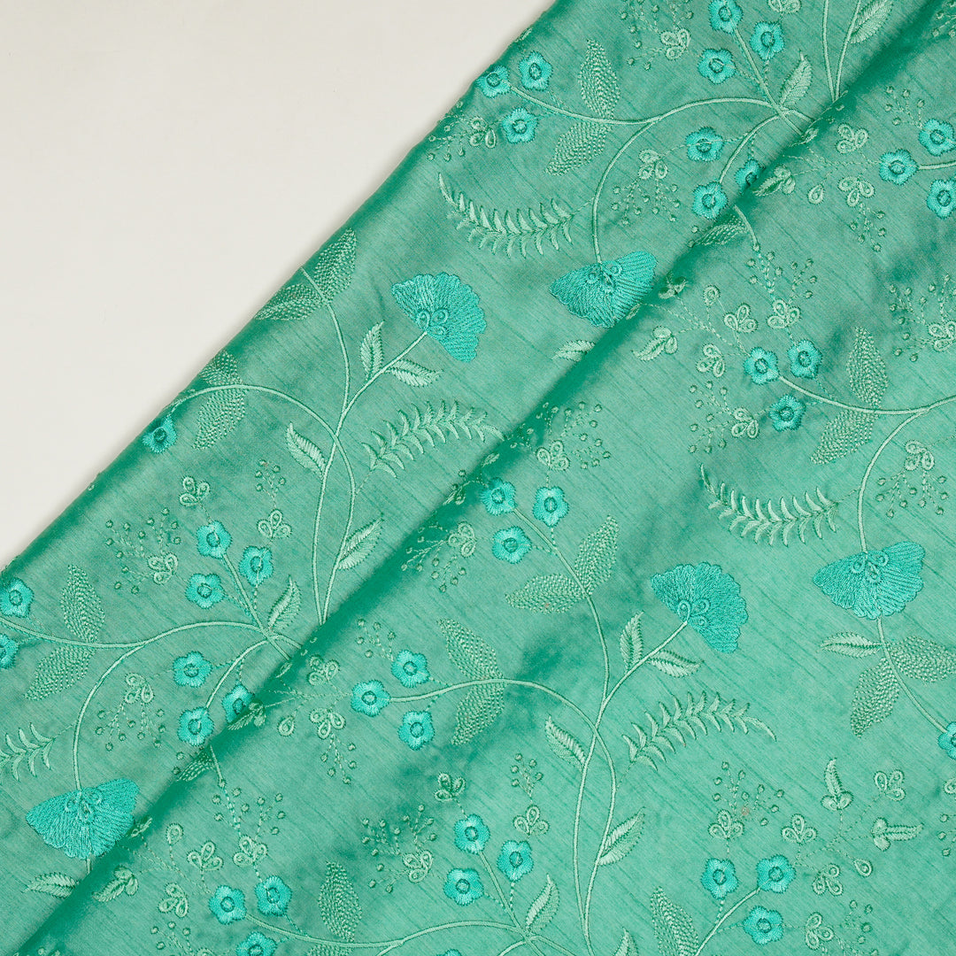 Azin Jaal on Aqua Semi Raw Silk Embroidered Fabric