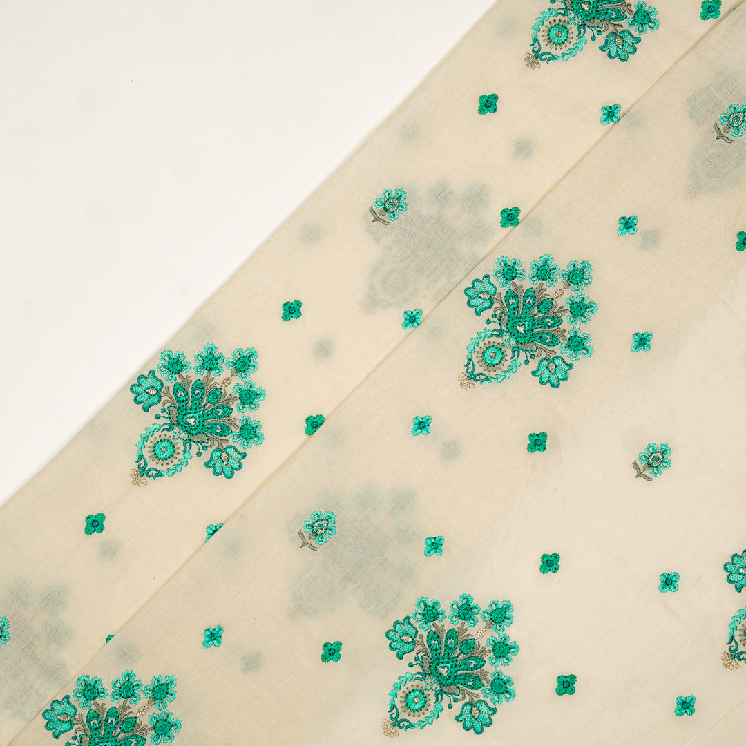 Rituja Buta Buti Mixture on Cream/Teal Malmal Embroidered Fabric