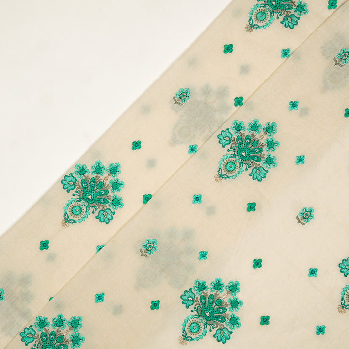Rituja Buta Buti Mixture on Cream/Teal Malmal Embroidered Fabric