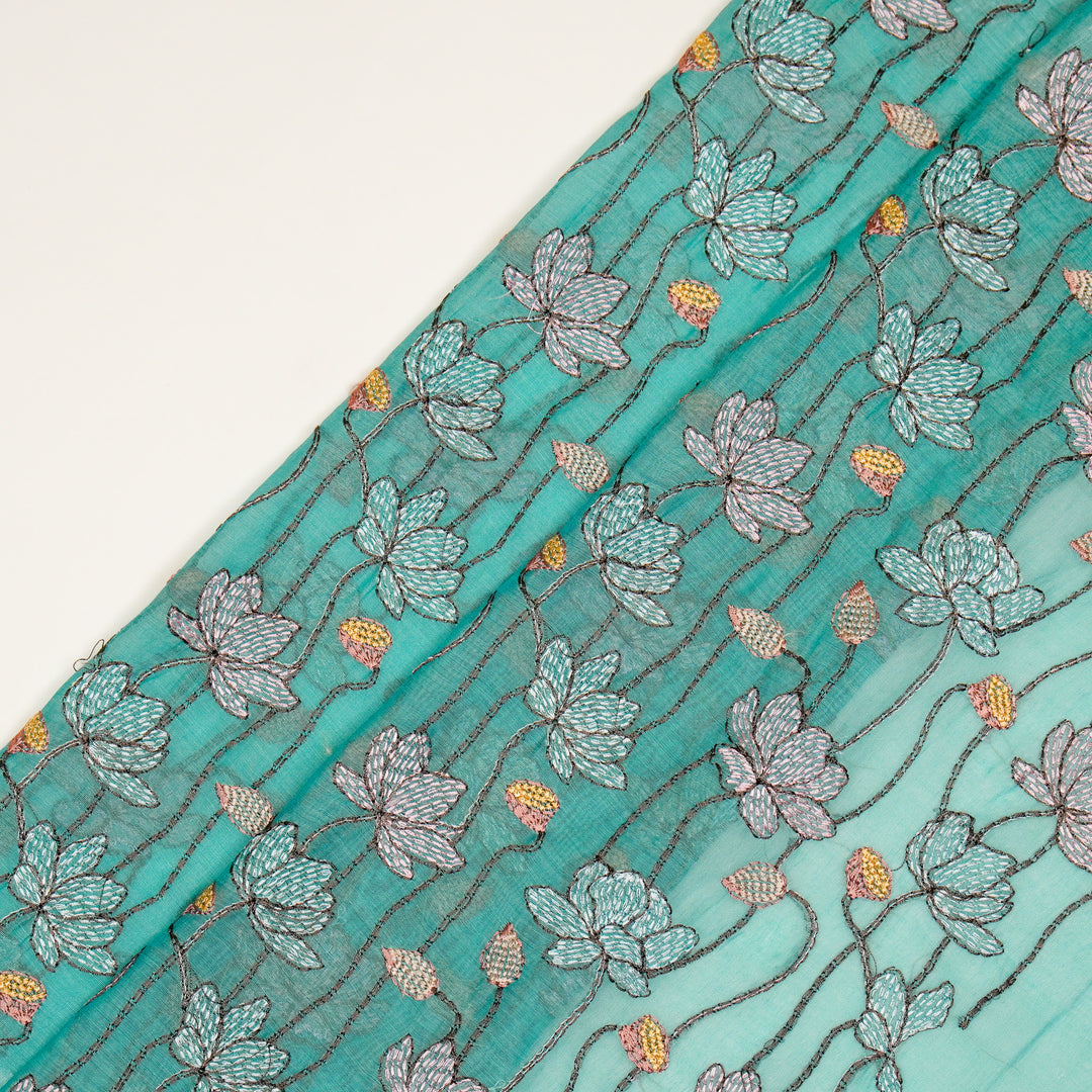 Raneem Jaal on Turquoise Cotton Silk Embroidered Fabric